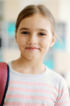 Preteen secondary school student backpack positive smile emotion 