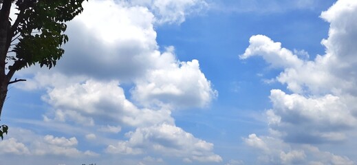 Blue sky with white clouds background. Sky daylight natural view