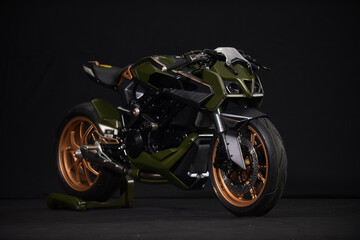 Custom handmade motorcycle cafe racer style with green matte color inspiration from super car design