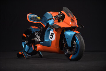 Custom handmade motorcycle cafe racer style with blue and orange color with aluminium detail