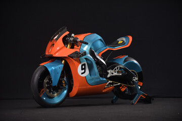 Custom handmade motorcycle cafe racer style with blue and orange color with aluminium detail