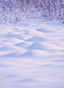 Arctic winter, abstract details of a piles of windblown snowdrift