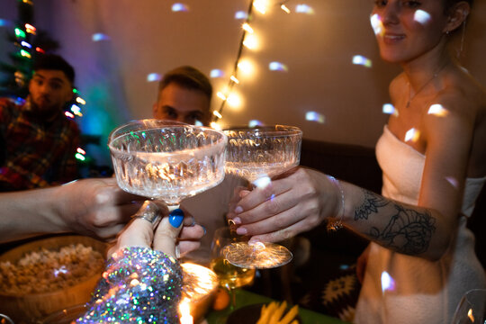 Clicking glasses at the New Year and Christmas party