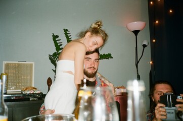 Couple hugging at the party