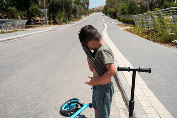 Little Child Beats Heat with T-Shirt on Hot Summer Day.