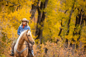 Cowgirl on a Palomino