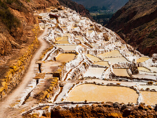 Picturesque salt evaporation ponds of Maras in the sacred valley of Incas, Cusco region, Peru - 753845872