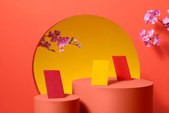Red envelopes, flower branch and lucky ornaments for lunar new year
