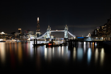 Fototapeta na wymiar London River Cityscape with Tower Bridge crossing the River Thames at Night