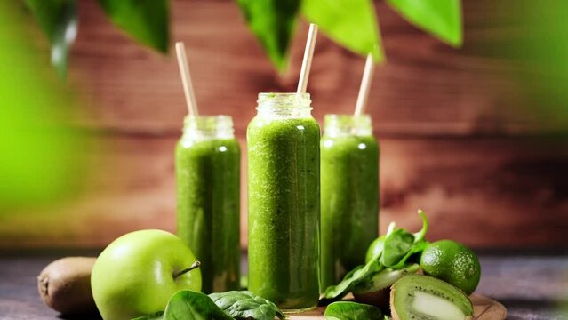 Green smoothie made from fresh raw fruits and vegetables, stock video footage 4k