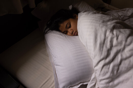 Young girl sleeping in the morning in winter season