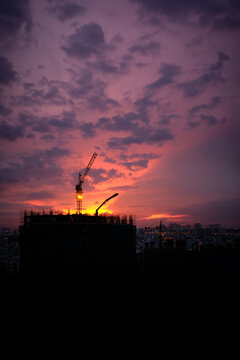 Cityscape of the constraction site in sunset