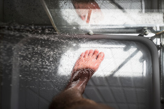 Washing feet in the shower
