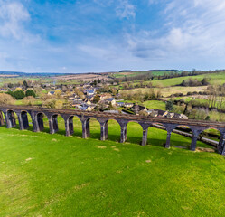 An aerial view over Harringworth and the spectacular Harringworth Viaduct on a bright winter day
