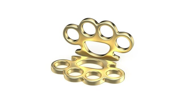 Pair of brass knuckles on white background