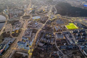 Fototapeta premium Aerial spring view of sunset dusk in Vilnius city center, down town, Šnipiškės district, Lithuania