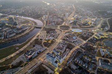 Fototapeta premium Aerial spring view of sunset dusk in Vilnius city center, down town, Šnipiškės district, Lithuania