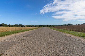 narrow paved road in summer, paved road