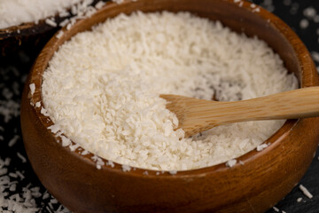 white coconut pulp and dried coconut flakes