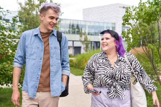Two Cute Friends University Students Strut On Street