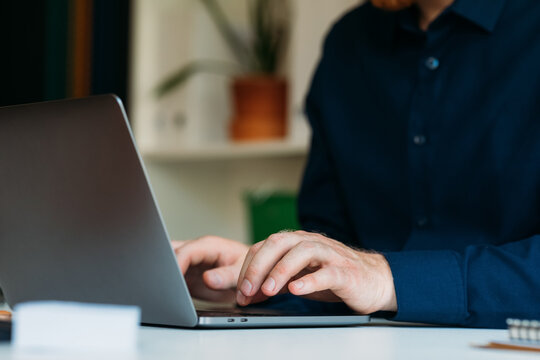 Man Working at His Laptop