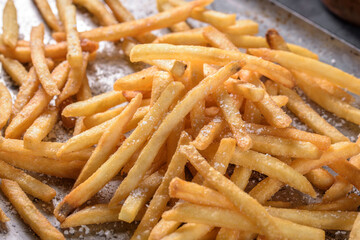 Satisfying Crunch: 4K Ultra HD Image of Delicious Crispy French Fries Close-Up