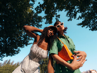 Young multiracial friends selfie outdoors