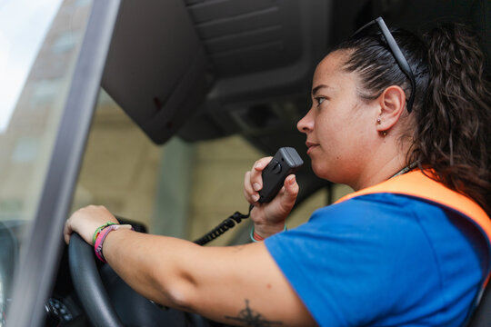 female paramedic speaking on the radio station