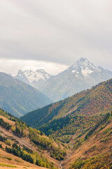 mountains, sky and forest in valley. Place for trekking tourism
