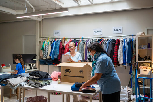 volunteers packing donatives for delivery 