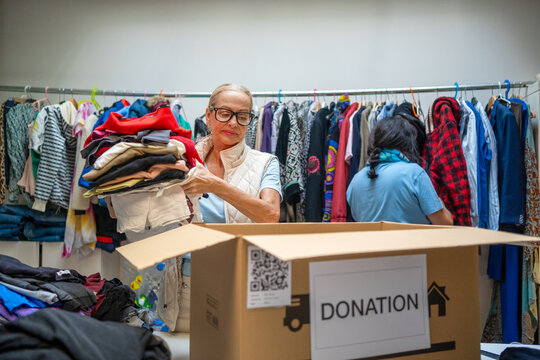 volunteers packing donatives for delivery 