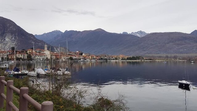 spectacular view of lakeside of Pallanza village on Maggiore Lake in Italy in silent time of sunset during winter period 4