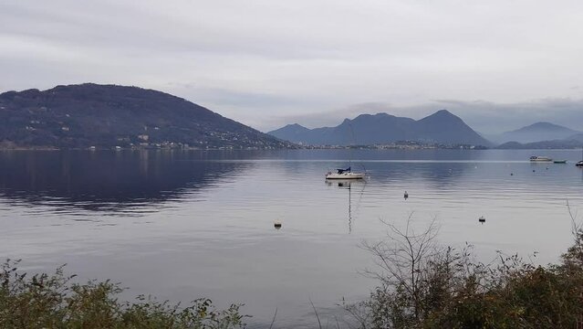 spectacular view of lakeside of Pallanza village on Maggiore Lake in Italy in silent time of sunset during winter period 2