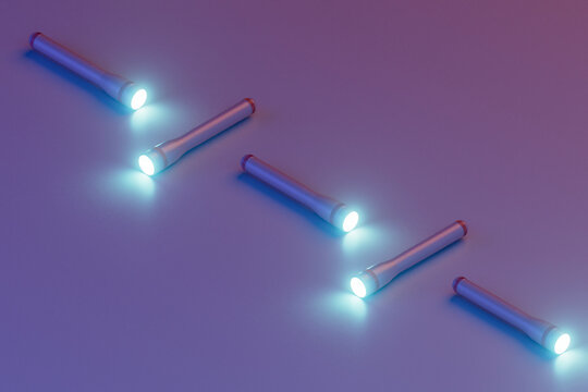 a row of flashlight emitting light
