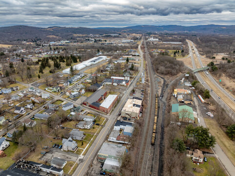 Waverly, NY, USA - 03-03-2024 - Cloudy winter aerial image of the downtown area in the Village of Waverly, NY. 