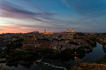 Fototapeta na wymiar Night view of the medieval historic city of Toledo, in Spain