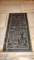 Stone plaque marking a Christian burial in the Mosque-Cathedral in Cordoba, Spain