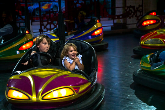 happy family portrait at amusement park 