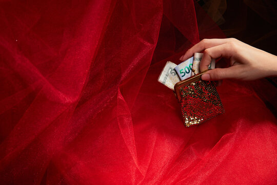 Hand grabbing wallet