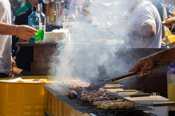 Street party with grilled meat skewers (souvlaki) at Smokey Thursday (Tsiknopempti) in Limassol, Cyprus 