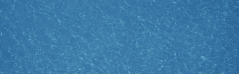 Swimming pool, swimming pool with blue chlorinated water, summer and bathing fun in the sunshine