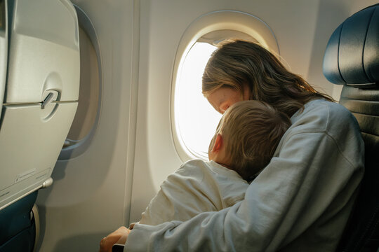 Mother And Son On Airplane