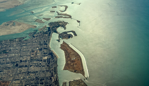 Aerial landscape view of Downtown area of City of Abu Dhabi, capital of Emirate of Abu Dhabi in UAE, located on a island in the Persian Gulf, with Corniche and Lulu Island