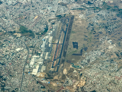 Aerial landscape view of "Addis Ababa Bole International Airport" in Bole district of Addis Ababa the capital of Ethiopia, with runway and terminal environment as well the surrounding area 