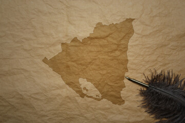 map of nicaragua on a old paper background with old pen
