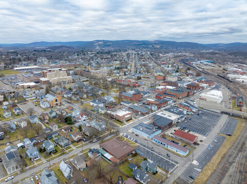 Sayre, PA, USA - 03-03-2024 - Cloudy winter aerial image of the downtown area in the City of Sayre, PA. 