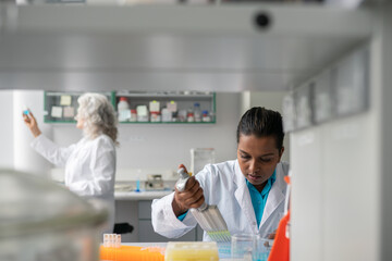Busy Scientists In Modern Lab