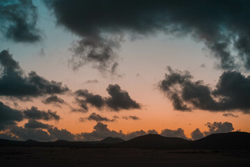 Magic orange sunset view.
A sunset is a natural phenomenon that occurs daily as the sun dips below the horizon, marking the end of daylight hours. It is a breathtaking and often picturesque event 