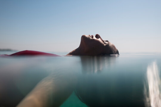Relaxed woman floating in the sea 
