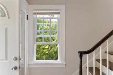 interior stairway of a home, home details, window with sunny view